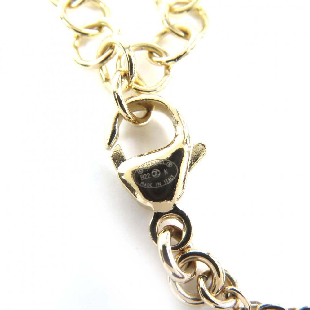 CHANEL Gold Pearl Logo Necklace - Picture 8 of 8